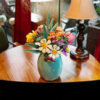 DIY flower building blocks set with colorful pieces and assembled bouquet display for creative construction and home decoration