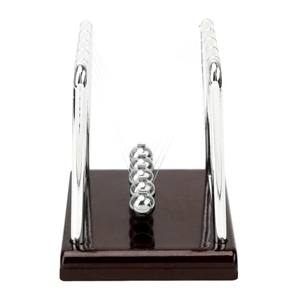 Newton's Cradle physics pendulum desk toy with steel balls demonstrating momentum and energy laws