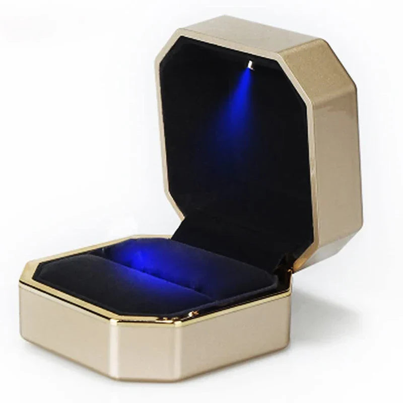 Gold jewelry box with blue interior LED ring box with automatic light for engagement proposals and wedding jewelry display