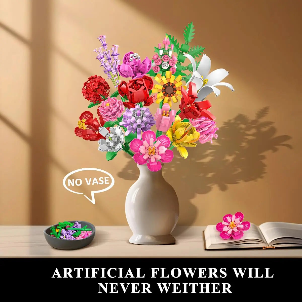 Colorful artificial flowers in a white vase on a wooden surface with a beige wall background.