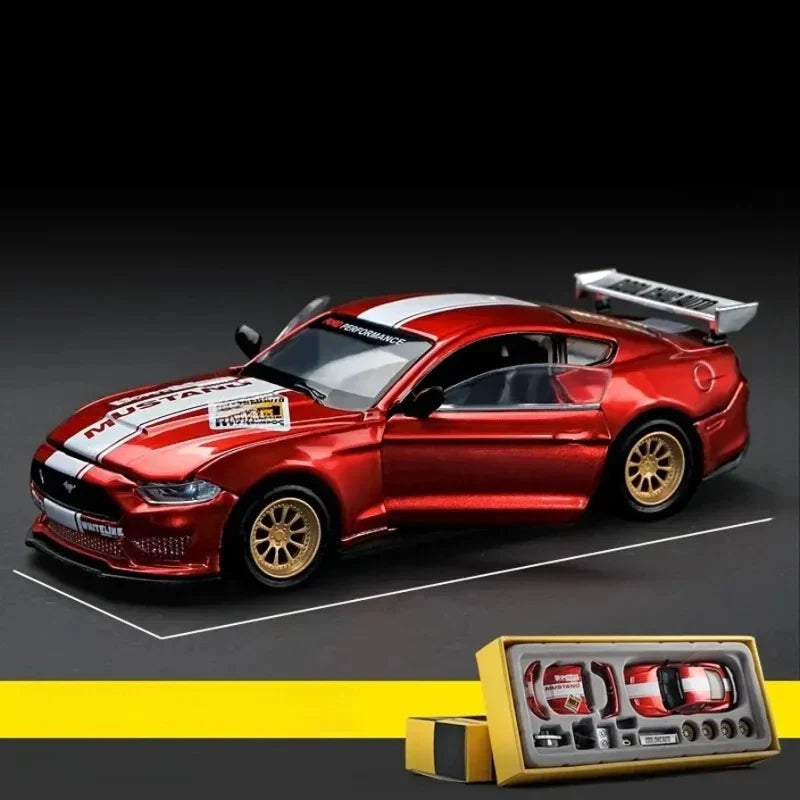 Red 1:42 Ford Mustang GT alloy model kit with spare body parts and gold rims, a buildable diecast for enthusiasts