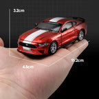 Red 1:42 Ford Mustang GT diecast model about 11 cm long, a compact alloy muscle car for desk and shelf display