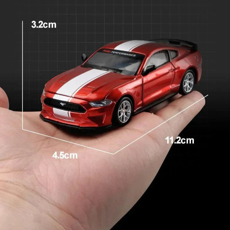 Red 1:42 Ford Mustang GT diecast model about 11 cm long, a compact alloy muscle car for desk and shelf display
