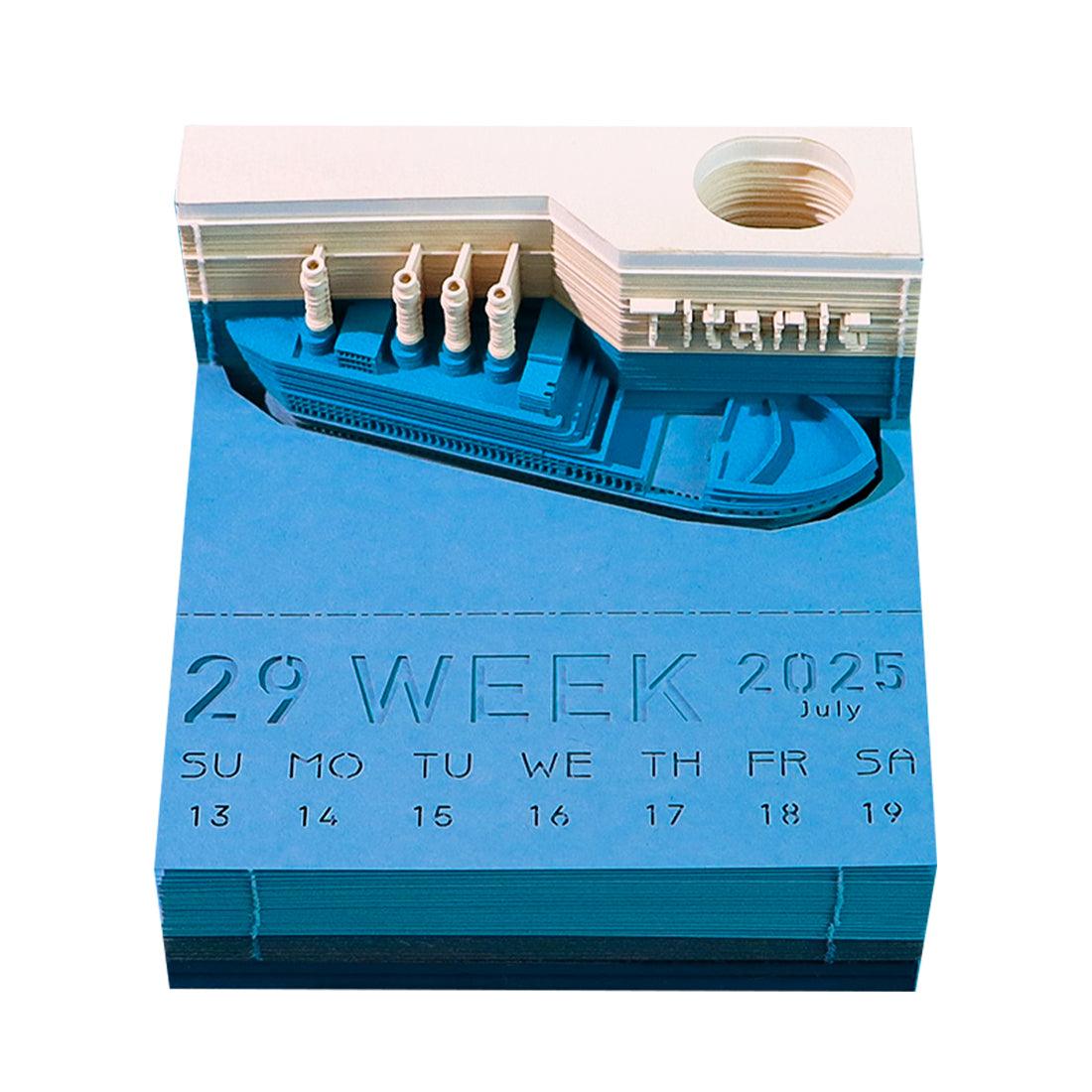 Tear-away note pad shaping a Tower paper sculpture page by page, a glowing LED desk ornament and built-in office calendar