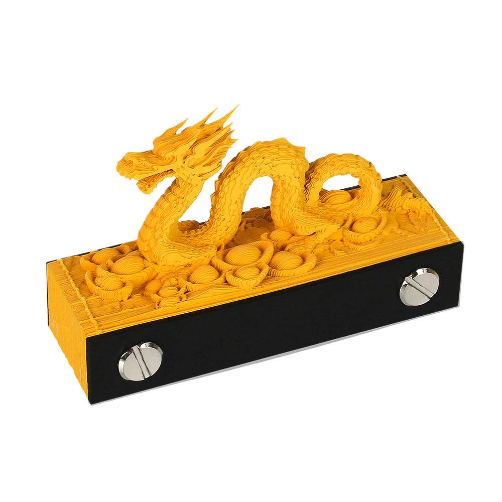 3D art memo pad forming a dragon paper sculpture page by page, the Dragon No Calendar version with a glowing touch LED base