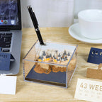 284 page memo pad forming a tree paper sculpture as sheets tear off, the Tree No Calendar version with a glowing LED base