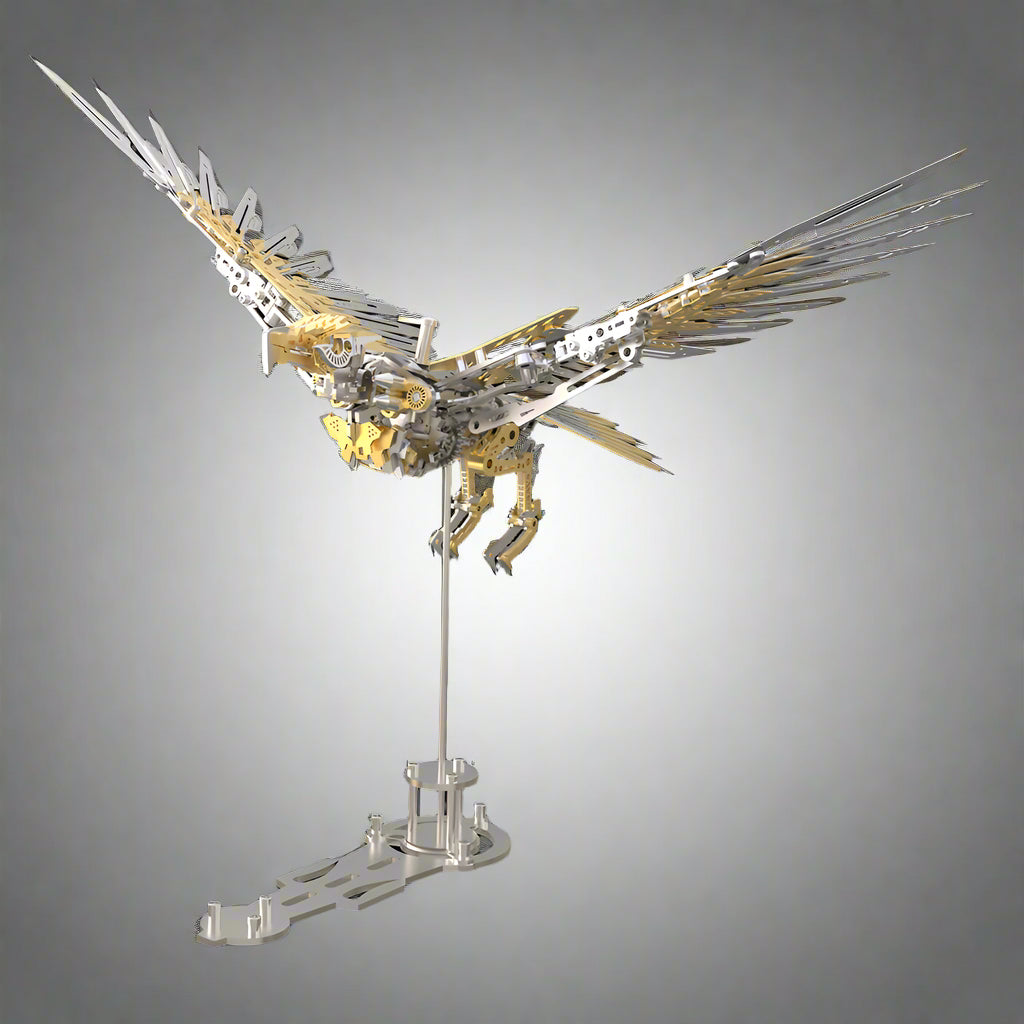 Gold and steel eagle model on a display stand with raised wings, a mechanical bird for collectors and builders Gold Eagle