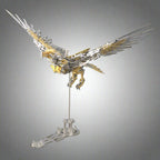 Gold and steel eagle model on a display stand with raised wings, a mechanical bird for collectors and builders Gold Eagle