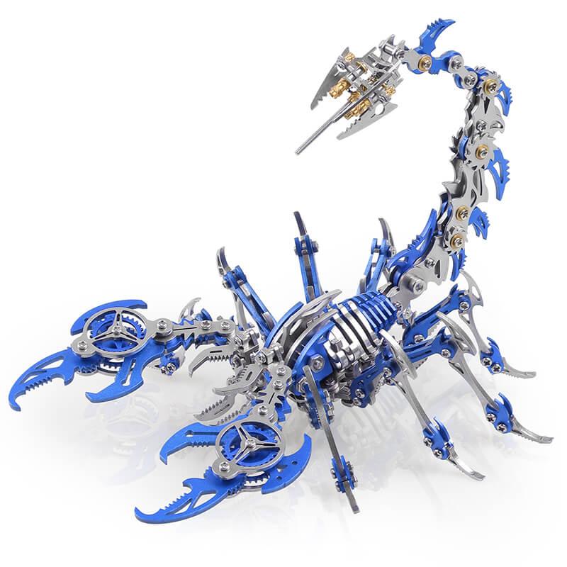 Blue mechanical scorpion puzzle built from 48 precision-cut steel pieces, an articulated model kit for shelf and office display