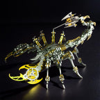 Gold and steel scorpion model with its articulated tail raised high, a mechanical metal puzzle kit for desk decor and gifts