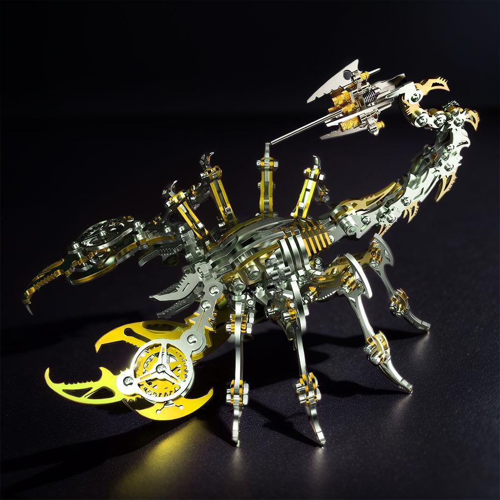 Gold and steel scorpion model with its articulated tail raised high, a mechanical metal puzzle kit for desk decor and gifts