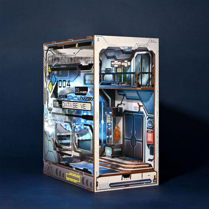Futuristic space station bookshelf insert with a glowing blue LED corridor and data server panel for sci-fi decor