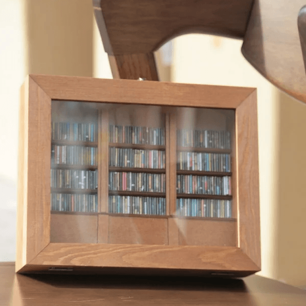 Tiny library shelf as a calming desk accent for readers, a hands on stress relief gift for a home office or study