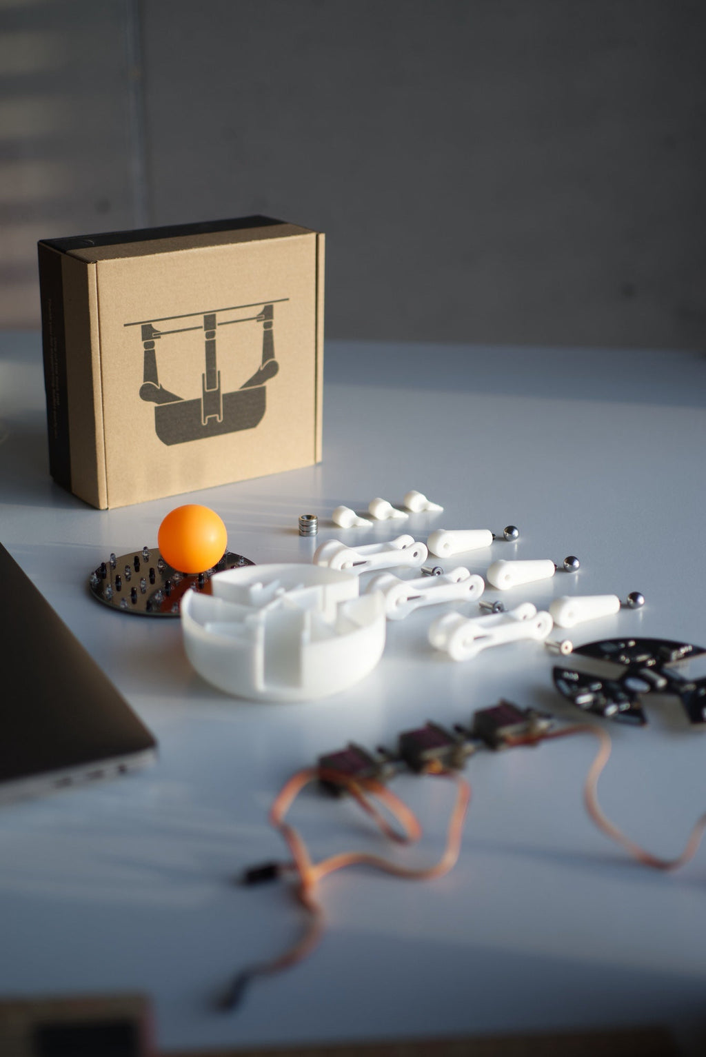 build your own robot kit contents with IR sensor board, servo motors and arms, no-soldering STEM ball balancing robot for teens
