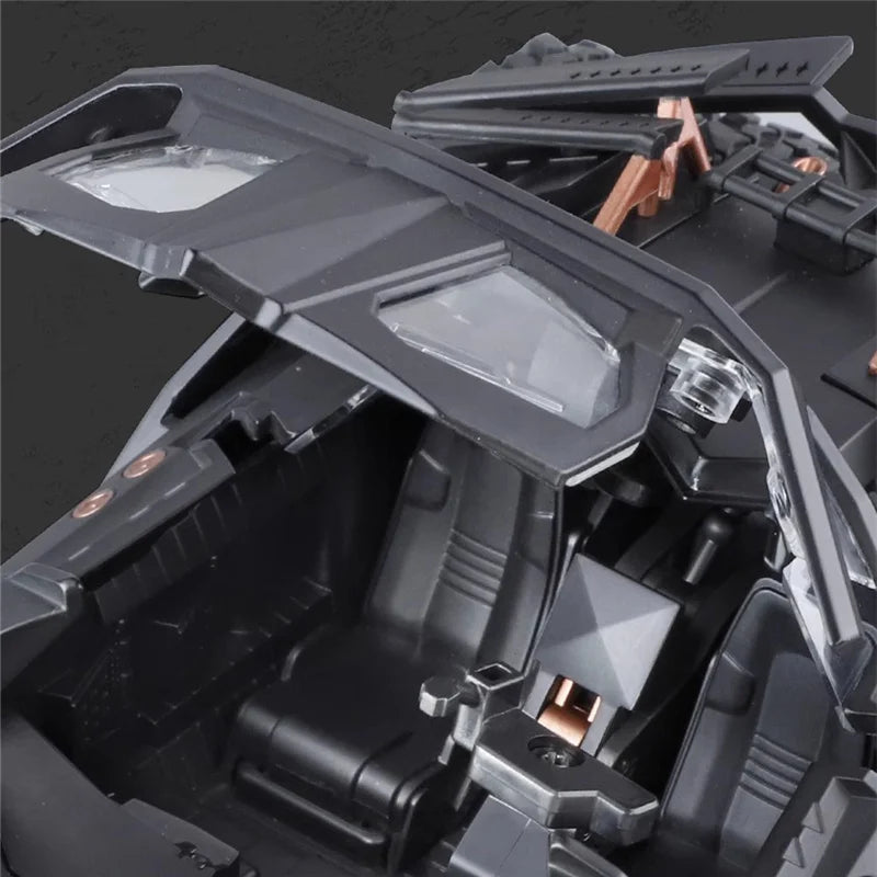 1:18 Batman diecast car with movie accurate shape and working lights for a home office shelf or Batcave display 1995 2 Tail version.
