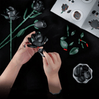 Black rose bouquet building set with LED glow and iridescent coating, mindful adult craft and mantel decor, in 3 rose and 12 rose sets