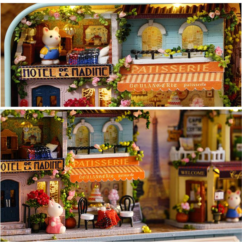 Eiffel tower and hotel facade in a Green Paris box theater miniature dollhouse kit and lit shelf display piece