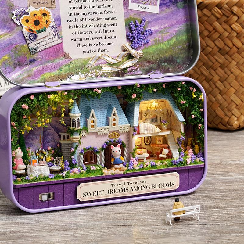 Box theater miniature dollhouse kit with a lavender garden cottage and warm LED lights inside a Purple metal tin