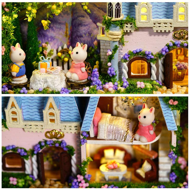Furnished garden cottage miniature with bunny figures and climbing vines in a Purple tin box theater craft kit