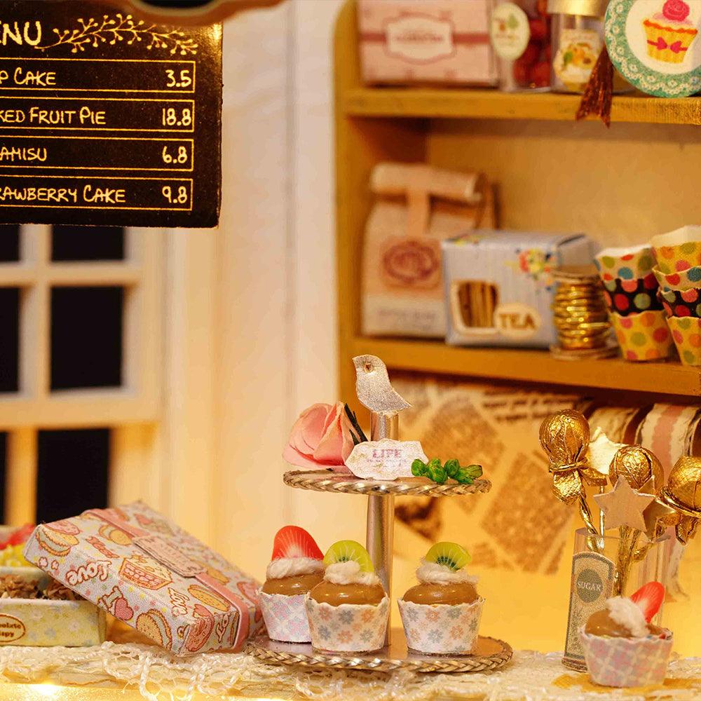 1:24 bakery dollhouse kit with resin desserts and a cake menu board, a hands-on miniature build for ages 14 and up