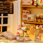 1:24 bakery dollhouse kit with resin desserts and a cake menu board, a hands-on miniature build for ages 14 and up