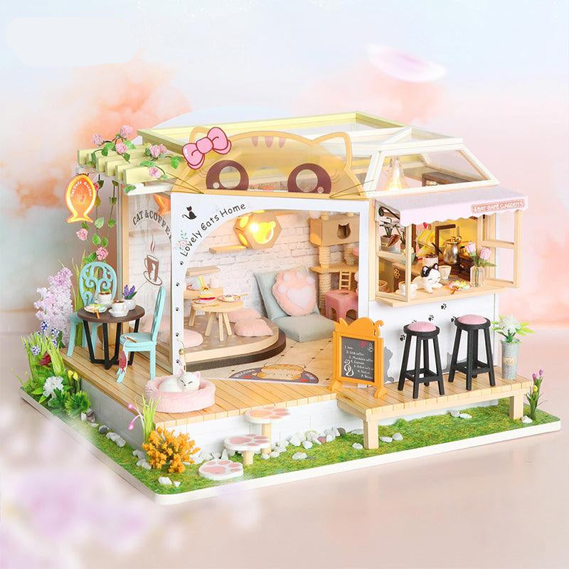 Miniature cat cafe dollhouse kit with glass roof lounge, garden patio and coffee bar for cat lovers to build and display