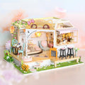 Miniature cat cafe dollhouse kit with glass roof lounge, garden patio and coffee bar for cat lovers to build and display
