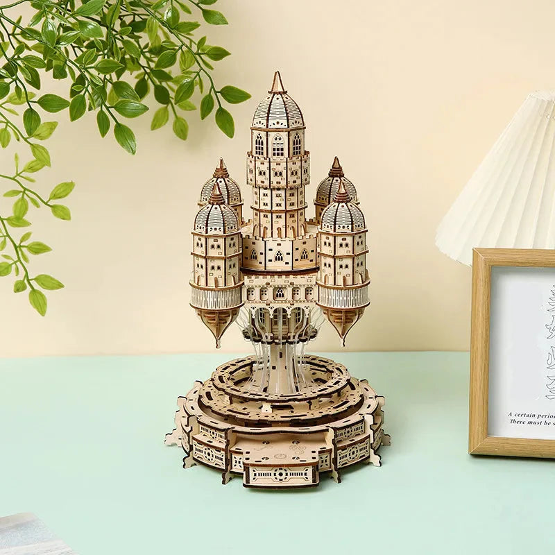 Illuminated castle music box puzzle as a fantasy bedside and desk display and a gift for teen and adult puzzle fans