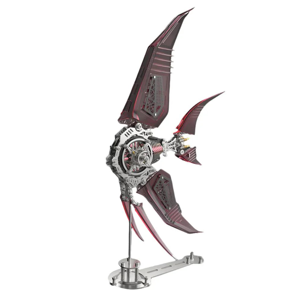 Red translucent winged angelfish metal model kit assembled on a display stand, a 500 piece stainless steel desk sculpture. Red