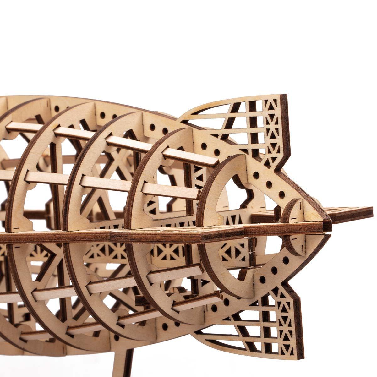 Hands-on steampunk model build assembling gears and propellers, a mechanical project for adult puzzle enthusiasts