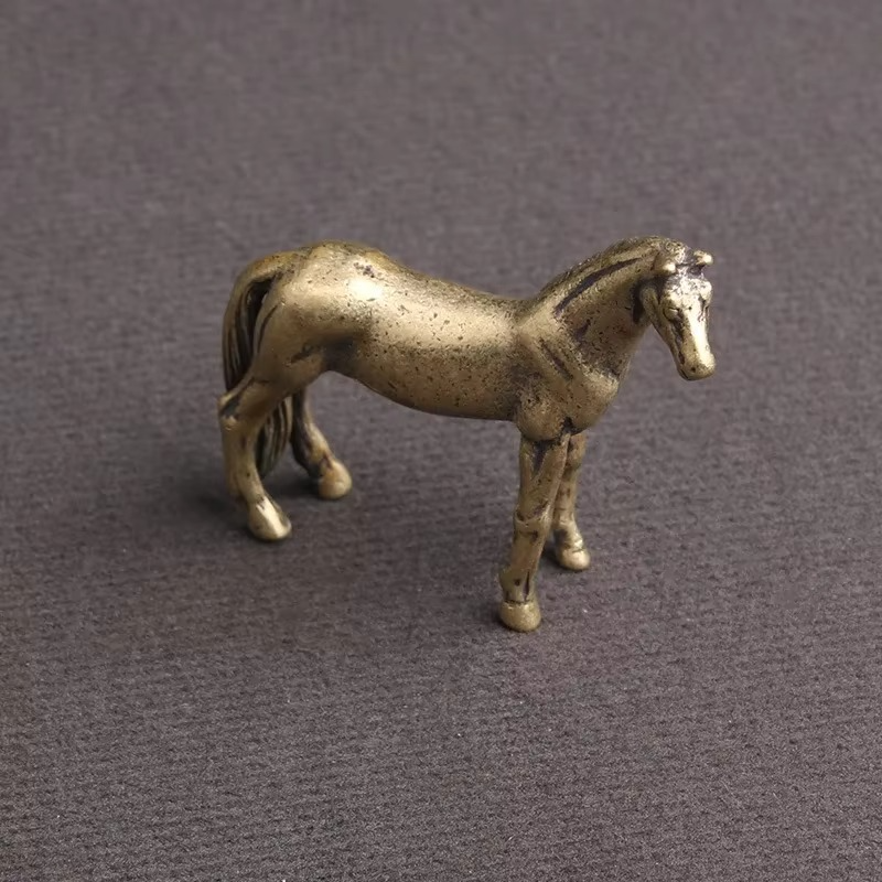 Antique bronze horse figurine with hand carved detail, a compact feng shui statue for office desks and curio cabinet display