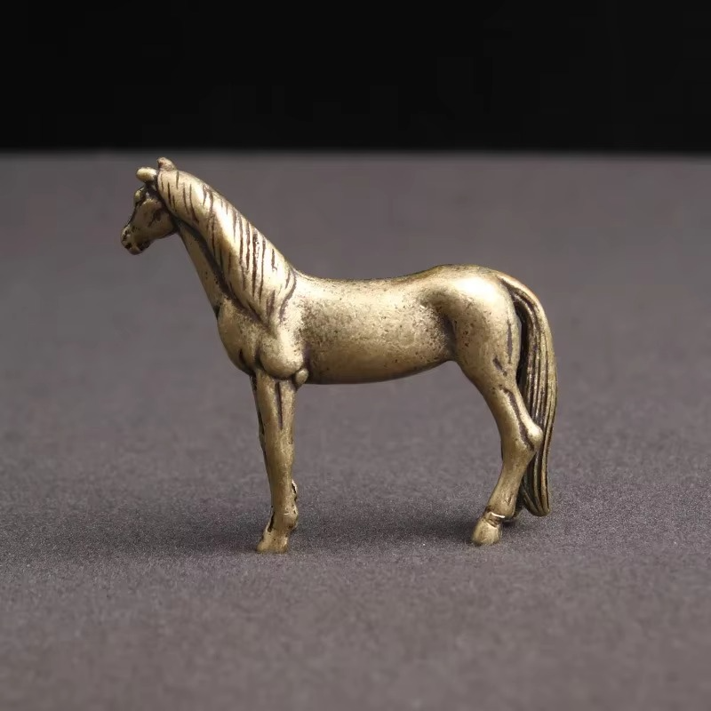Solid copper horse sculpture with a detailed mane and tail, a miniature zodiac figurine for tabletop and bookshelf decor