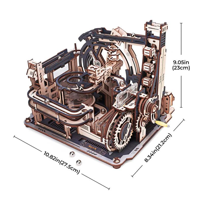 Working wooden marble run that sends metal balls through spiraling tracks as a STEM desk toy for enthusiasts Marble Spaceport Combination Set