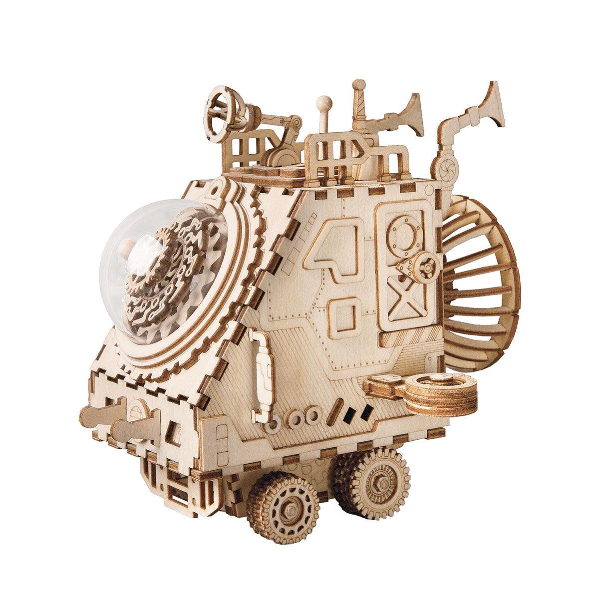 Cosmic Voyager steampunk spaceship music box kit with 164 laser-cut wooden pieces that plays Fly Me To The Moon