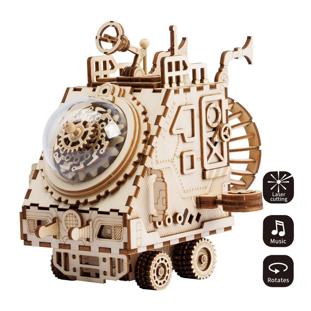 Wooden music box spaceship with a wind up mechanical movement, a hands-on 3D model kit for music box collectors and hobbyists