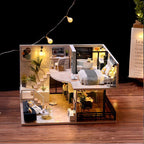 Furnished miniature loft diorama with a warm LED glow and a music box, a 1:24 two-story dollhouse kit for shelf decor