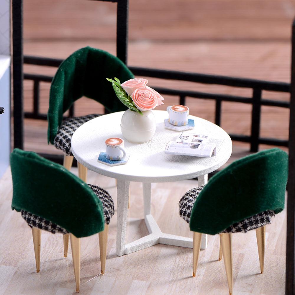 Miniature dining nook with green velvet chairs and a rose centerpiece, a 1:24 loft dollhouse kit and craft gift for teens