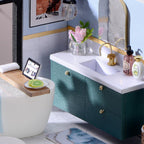 Miniature bathroom vanity with a marble sink and brass faucet, a 1:24 furnished loft dollhouse kit for bookshelf display