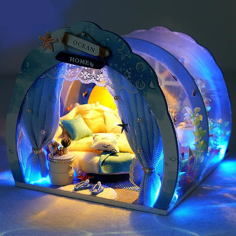 1:24 scale underwater dollhouse diorama you assemble into an ocean themed room box for a shelf or display cabinet