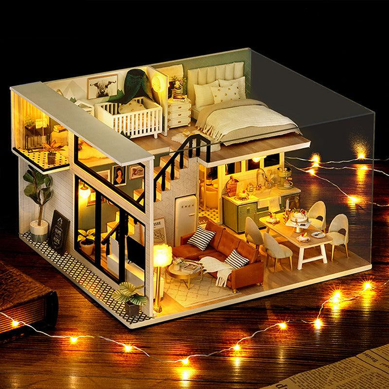 Miniature dollhouse with built-in LED lighting and a music box for a warm glowing cozy home ambiance