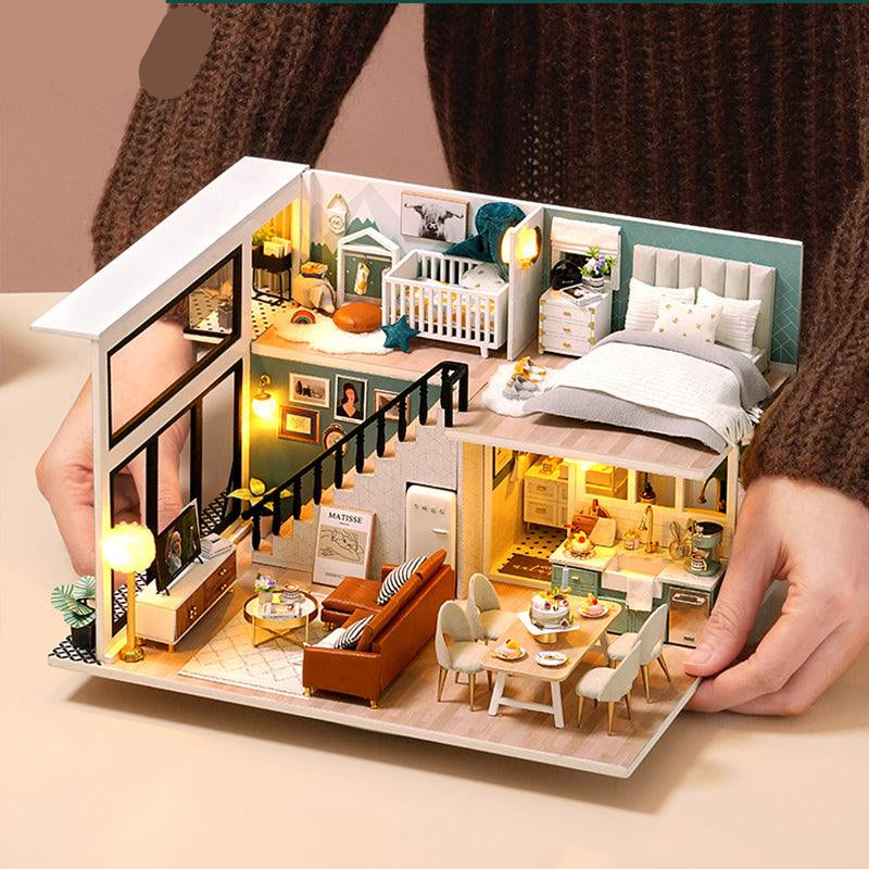 Finished cozy dollhouse scene as shelf decor, a wooden model kit with colored English instructions for beginners