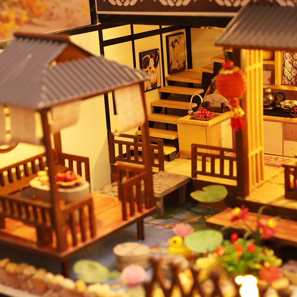 Japanese dollhouse kit with a wooden staircase and a garden pond, a 2 to 3 day build for adult miniature crafters