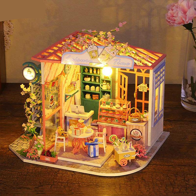 DIY dollhouse kit at 1:24 miniature scale with a built in music box, a floral room box to build for adult crafters Tea Time