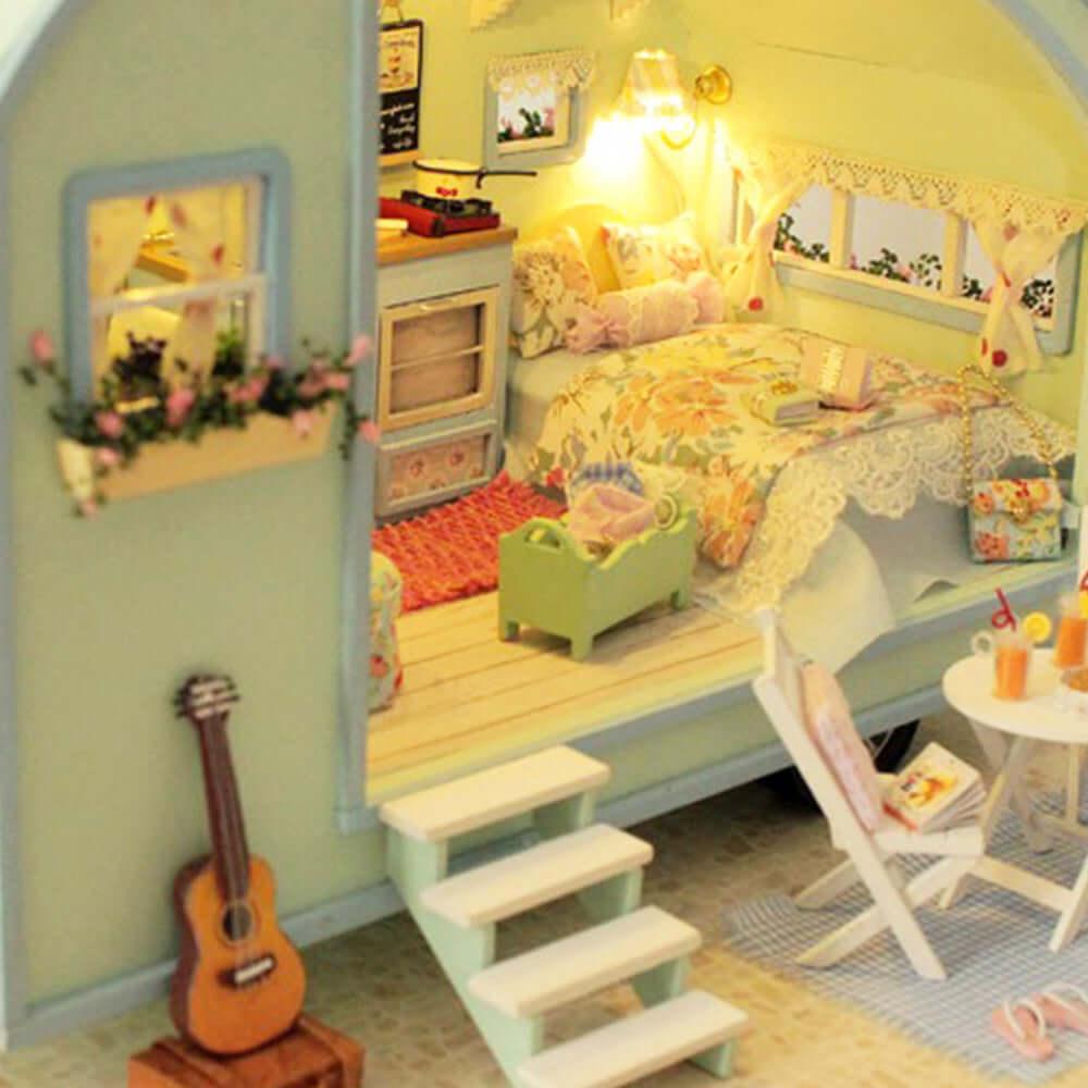 Furnished miniature caravan interior with warm LED lighting, a cozy camper diorama and screen free craft for adults