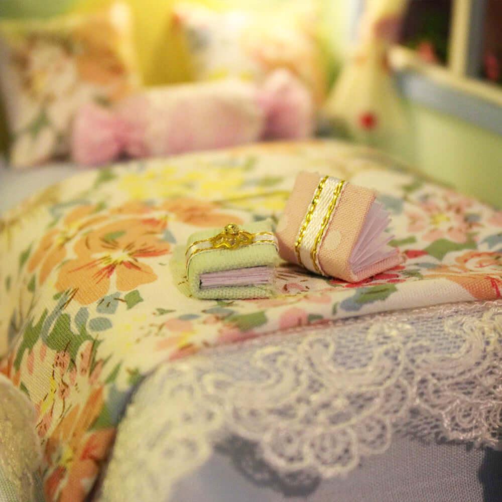 Cozy floral bedroom inside a miniature caravan kit, a hand built camper interior and vintage decor gift for crafters