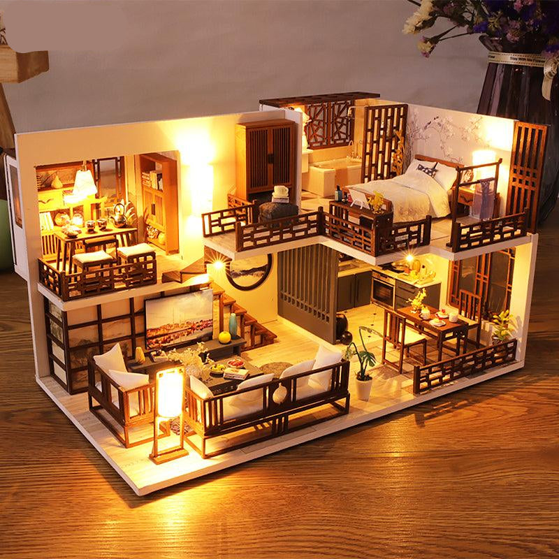 Miniature dollhouse kit with warm LED lighting and a working music box, a cozy 1:24 scale room scene for adult crafters