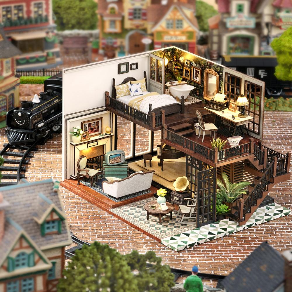 Handcrafted miniature house model as lit shelf decor for a bedroom or office, a screen-free building hobby for adults