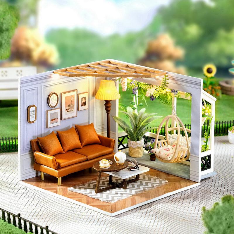 DIY miniature dollhouse kit with precut wooden parts and tiny furniture to build a detailed roombox for adults and teens