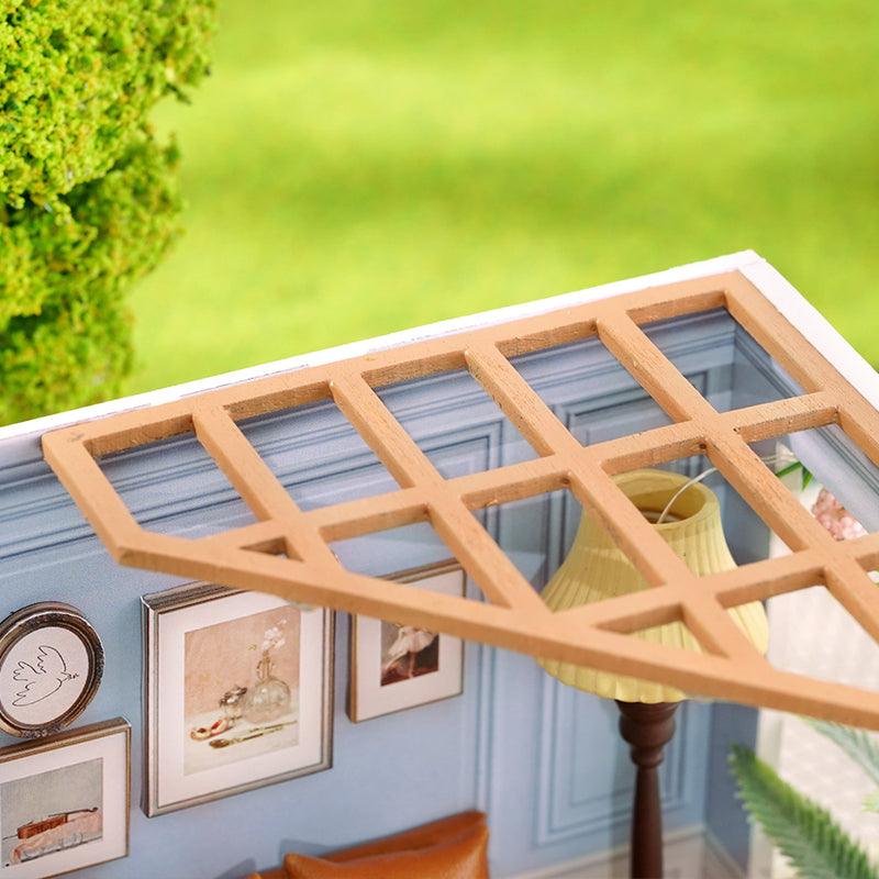 Warm Moment miniature room kit that builds a snug lamplit scene for miniature enthusiasts and dollhouse kit collectors