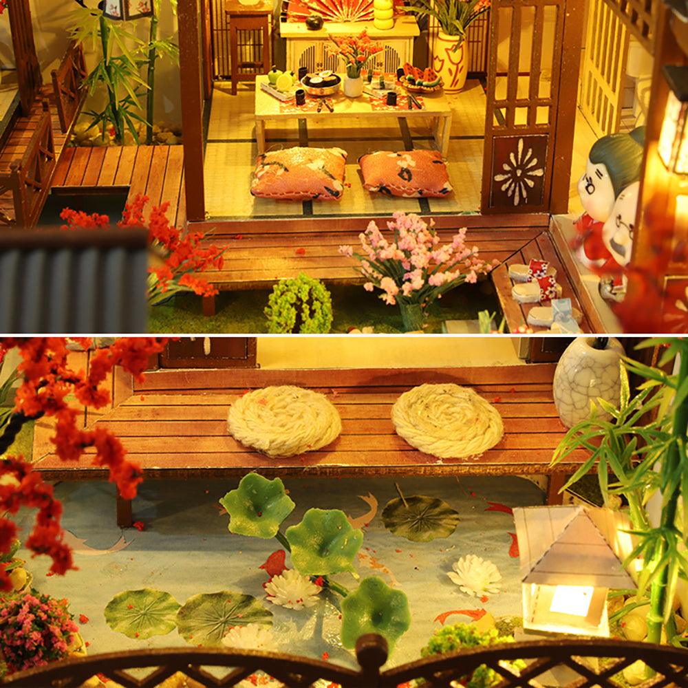Furnished miniature dollhouse interior with tatami rooms and a lotus garden pond, an Eastern model house building project